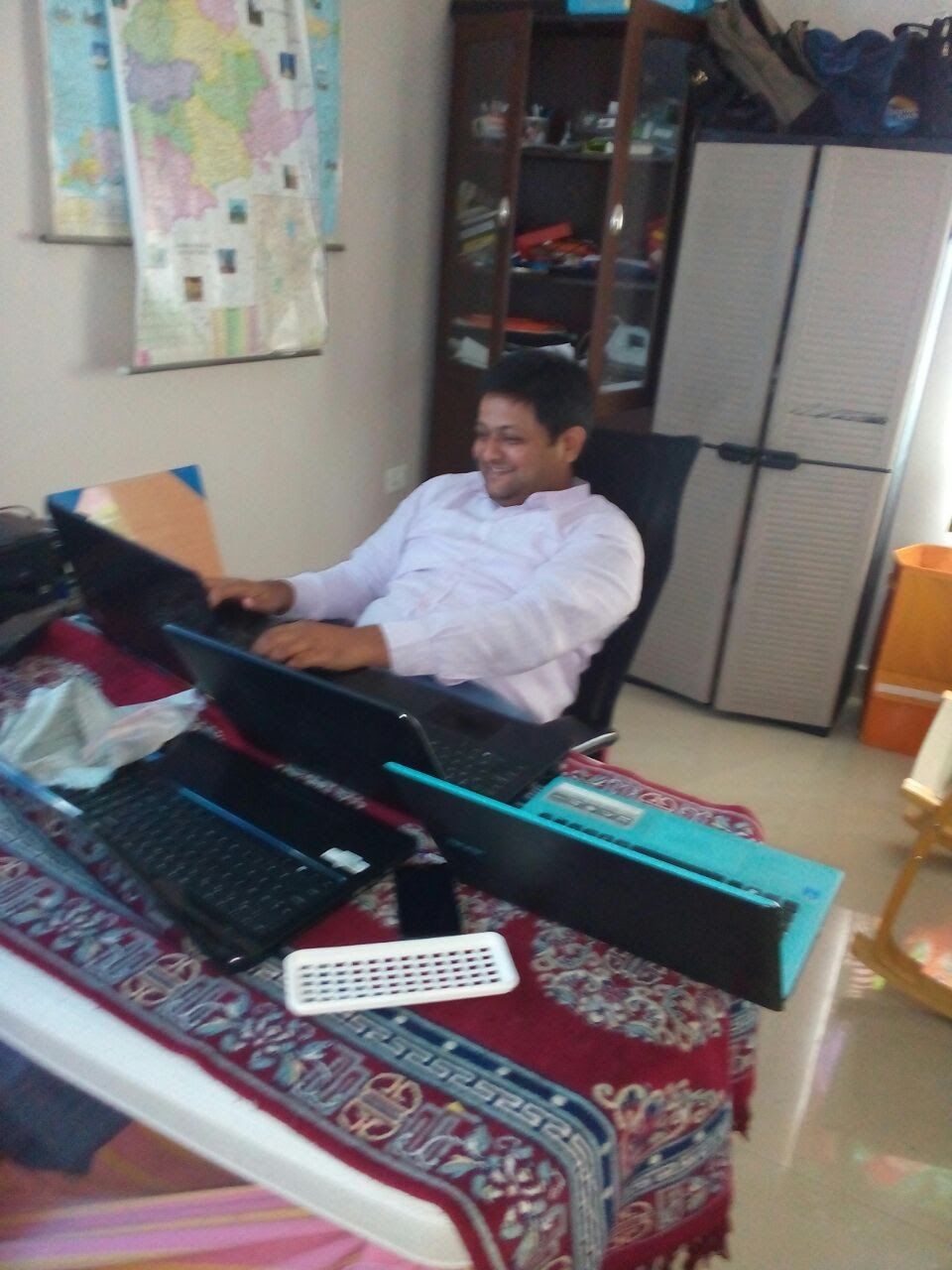 Susheel working from the Samarth apartment bedroom in the early days